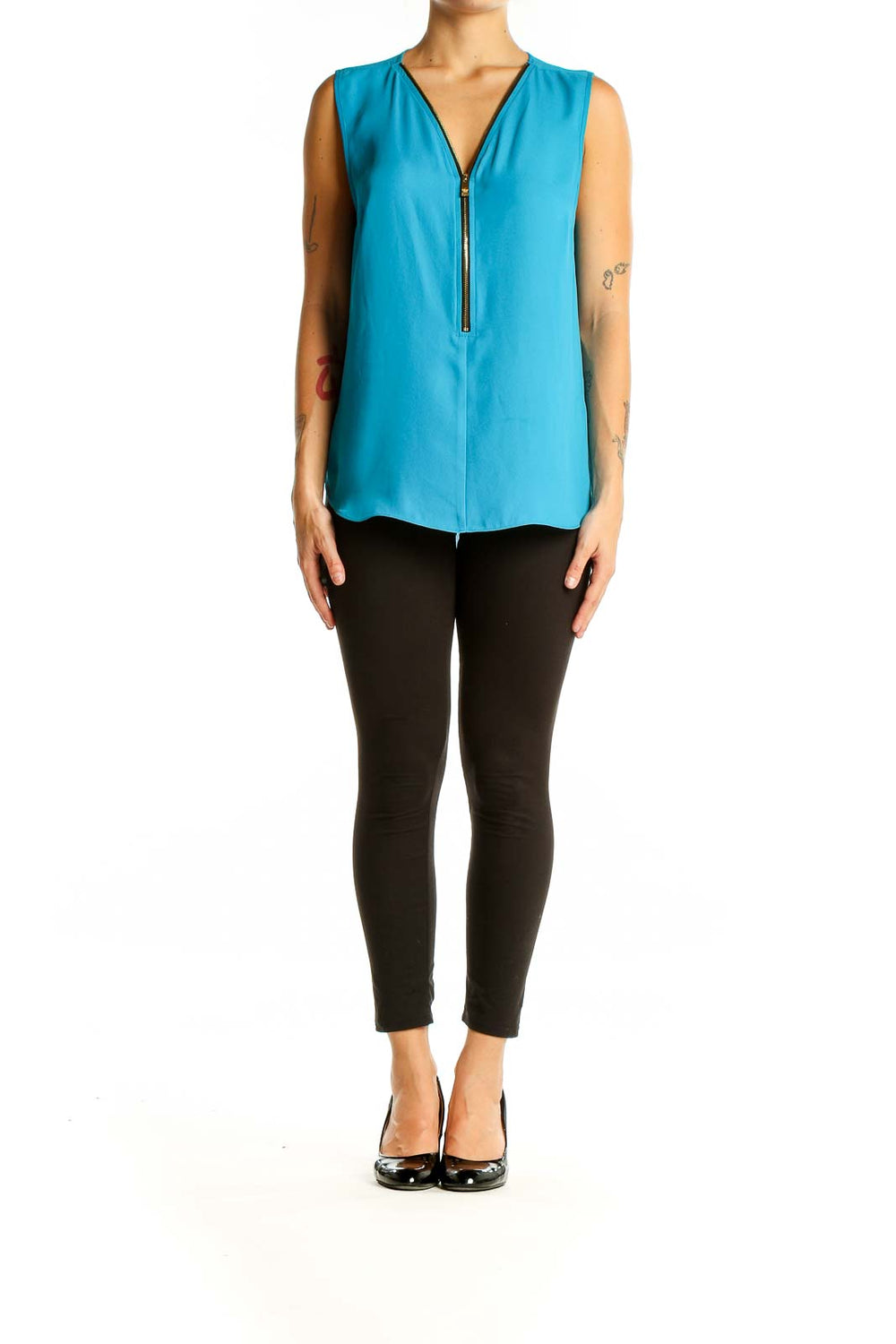 Front view of turquoise sleeveless blouse with zip-front detail