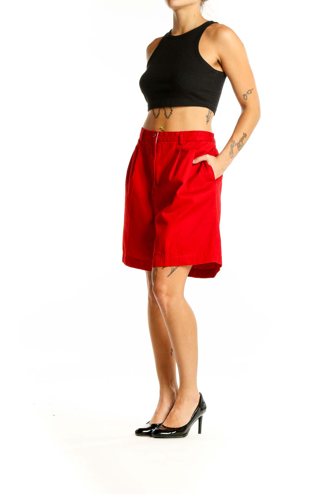 Front view of red Tommy Hilfiger pleated Bermuda shorts