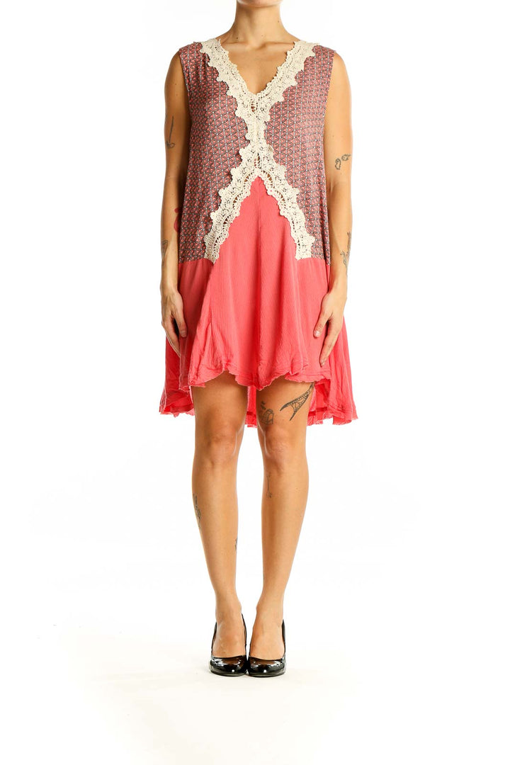 Front view of Umgee coral dress with floral print bodice and lace trim