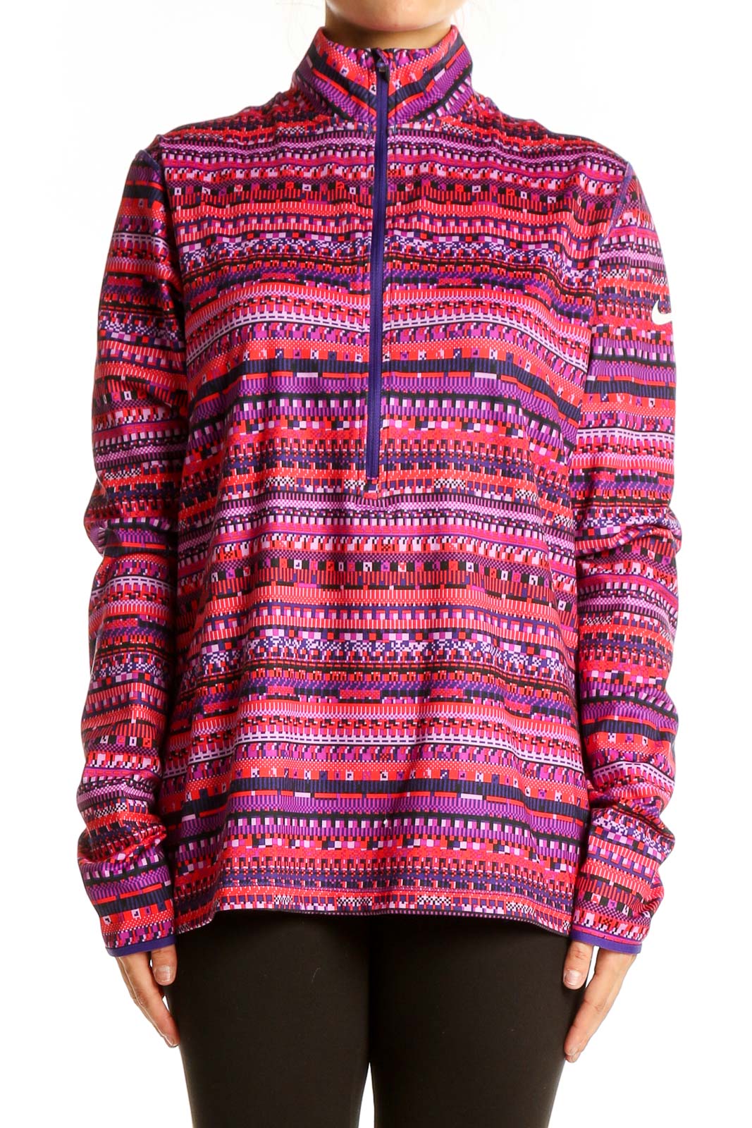 Front view of pink patterned Nike Pro half-zip activewear top