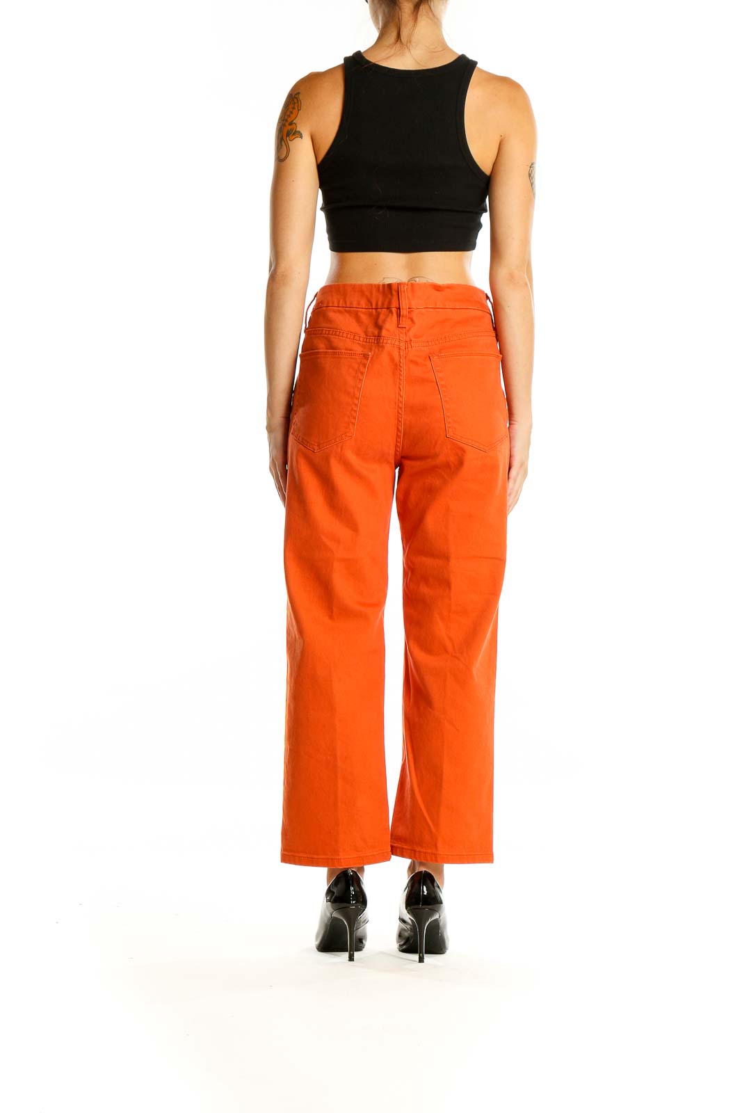 Back view of orange high-waisted wide-leg cropped jeans from Coldwater Creek