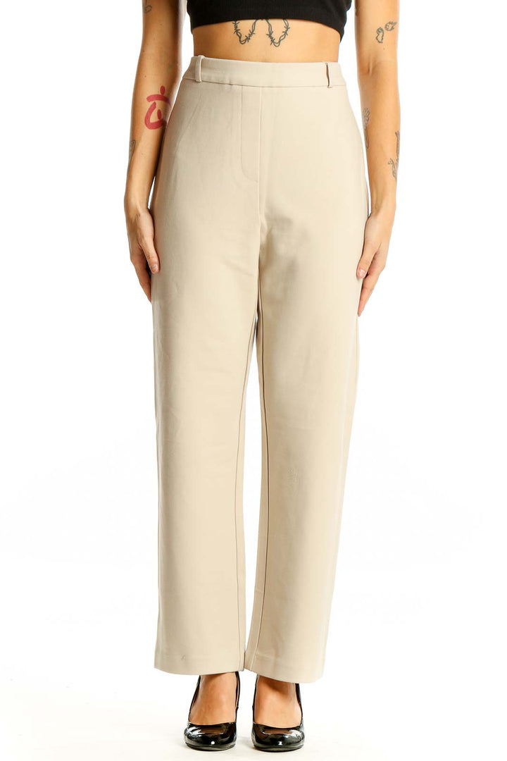 Front view of Jones New York beige high-waisted wide-leg trousers