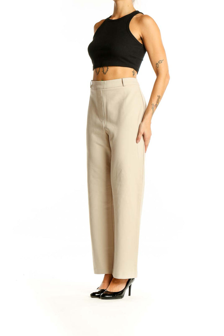 Front view of Jones New York beige high-waisted wide-leg trousers