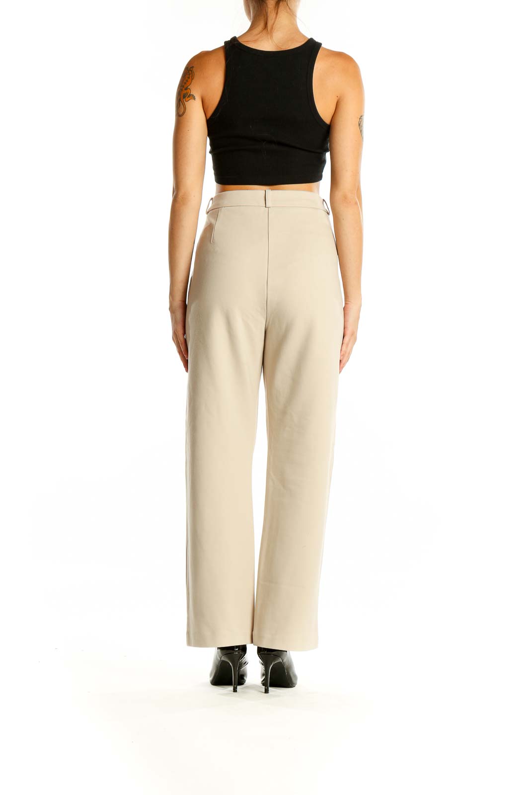 Back view of Jones New York beige high-waisted wide-leg trousers on model