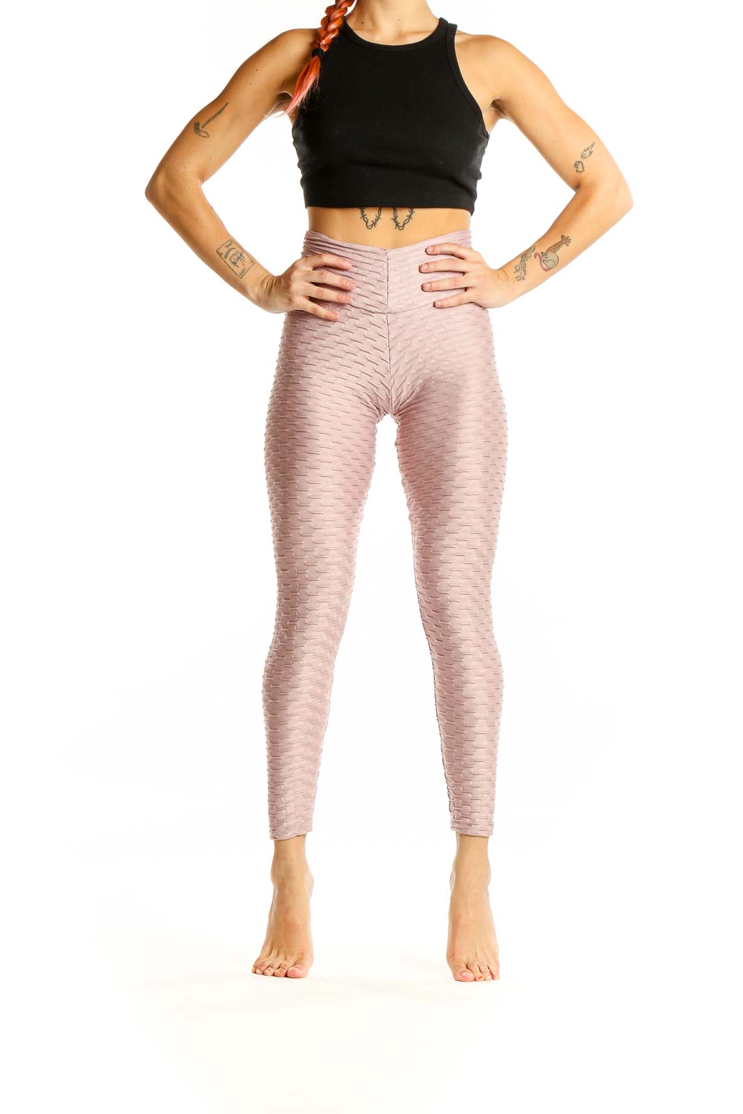 Front view of pink textured high-waist activewear leggings by Booty By Brabants