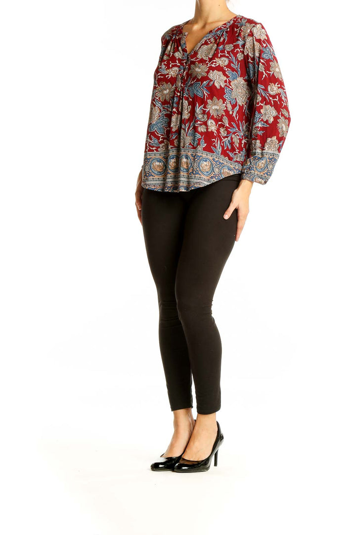 Front view of Lucky Brand red floral paisley blouse with button placket