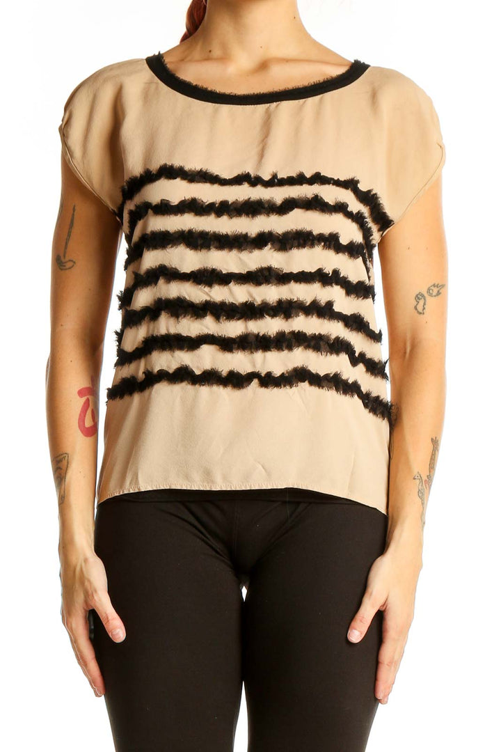 Front view of Mcginn beige cap sleeve blouse with black stripes