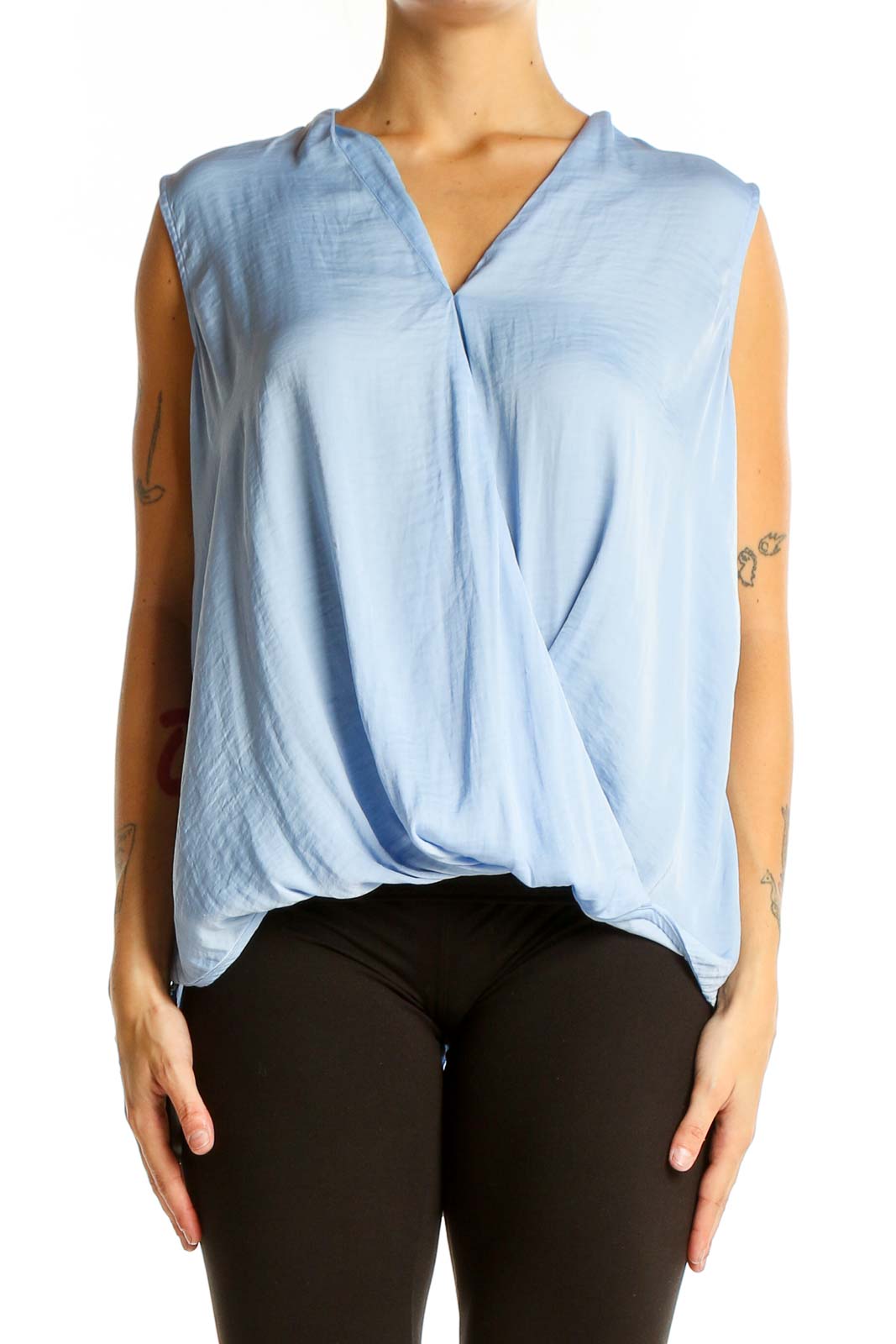 Front view of light blue sleeveless wrap top from Banana Republic