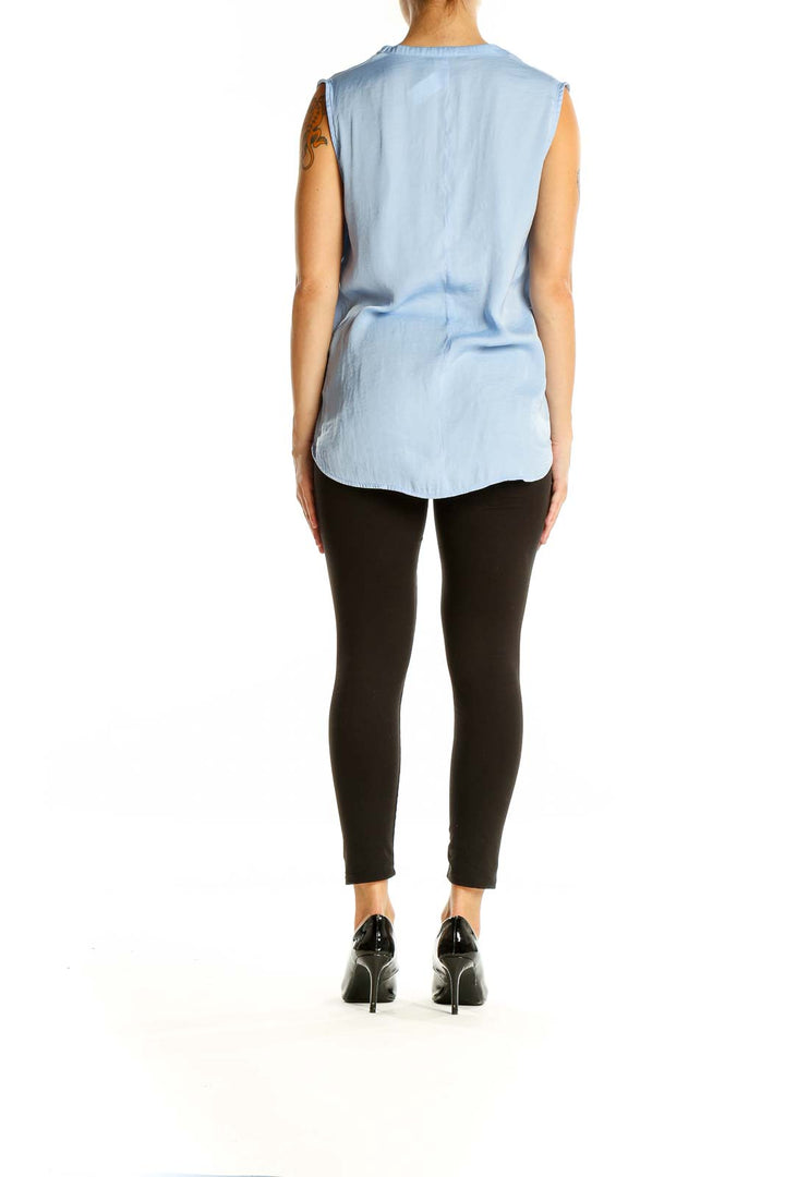 Back view of light blue sleeveless wrap top from Banana Republic