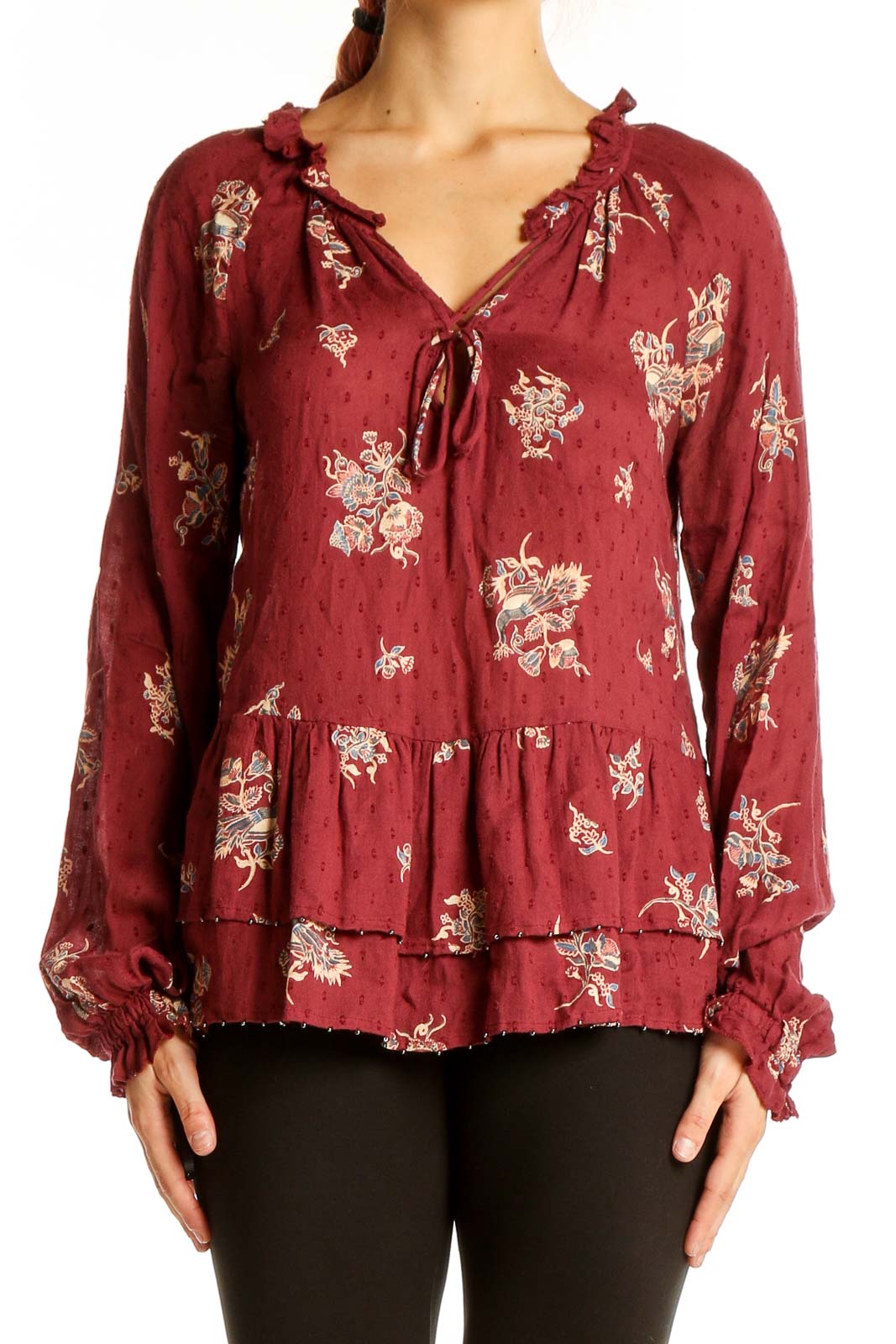 Front view of William Rast burgundy floral print peplum blouse with tie-front neckline