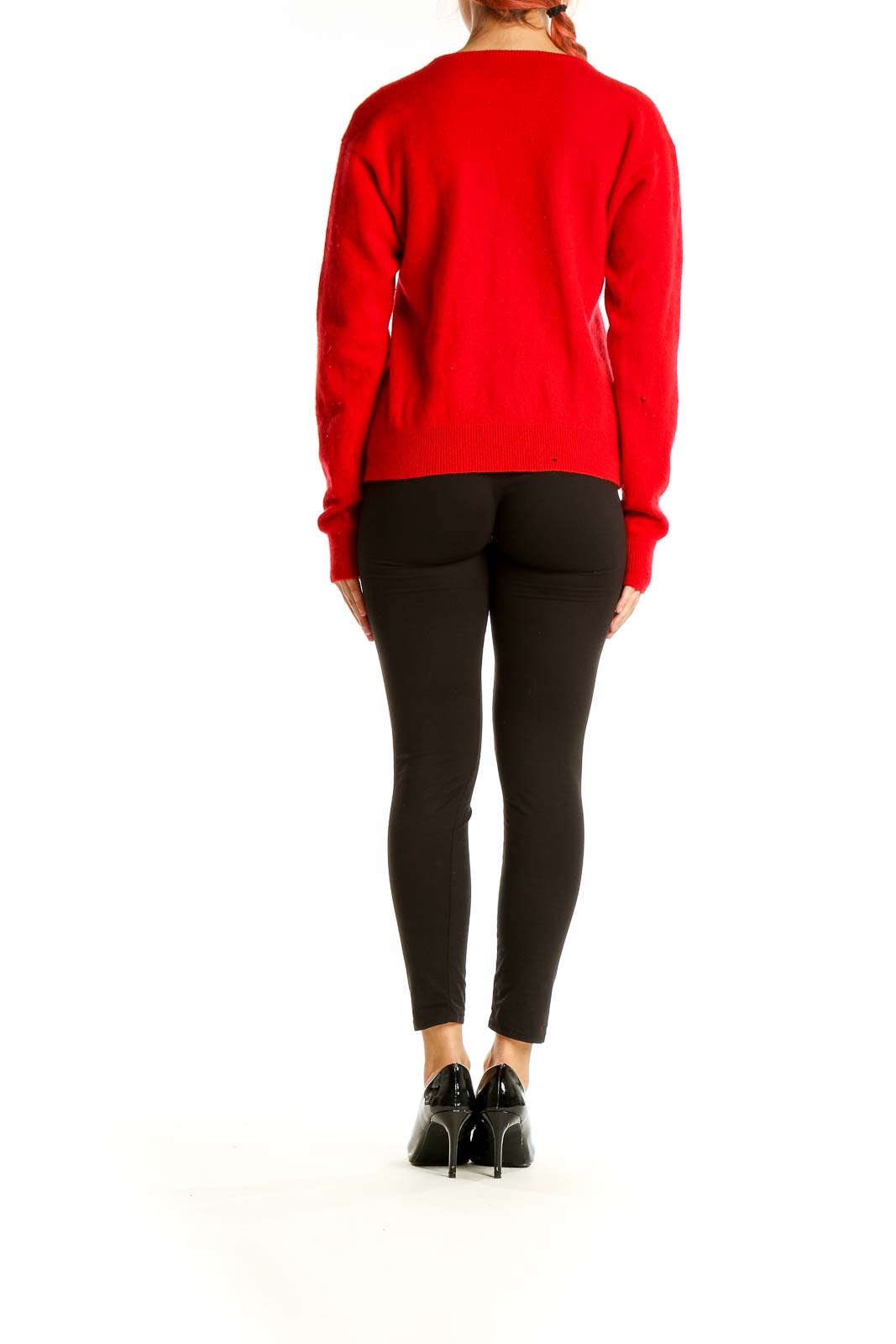 Back view of red Ralph Lauren cashmere crewneck sweater on model with black pants