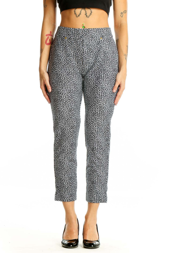 Front view of MICHAEL Michael Kors black and white leopard print cropped pants