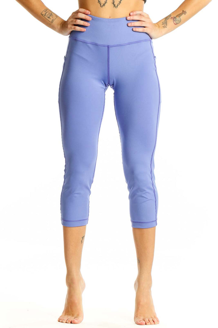 Front view of SUGOI periwinkle high-waisted capri activewear leggings