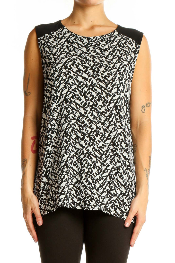 Front view of Vince Camuto black and white abstract print sleeveless top