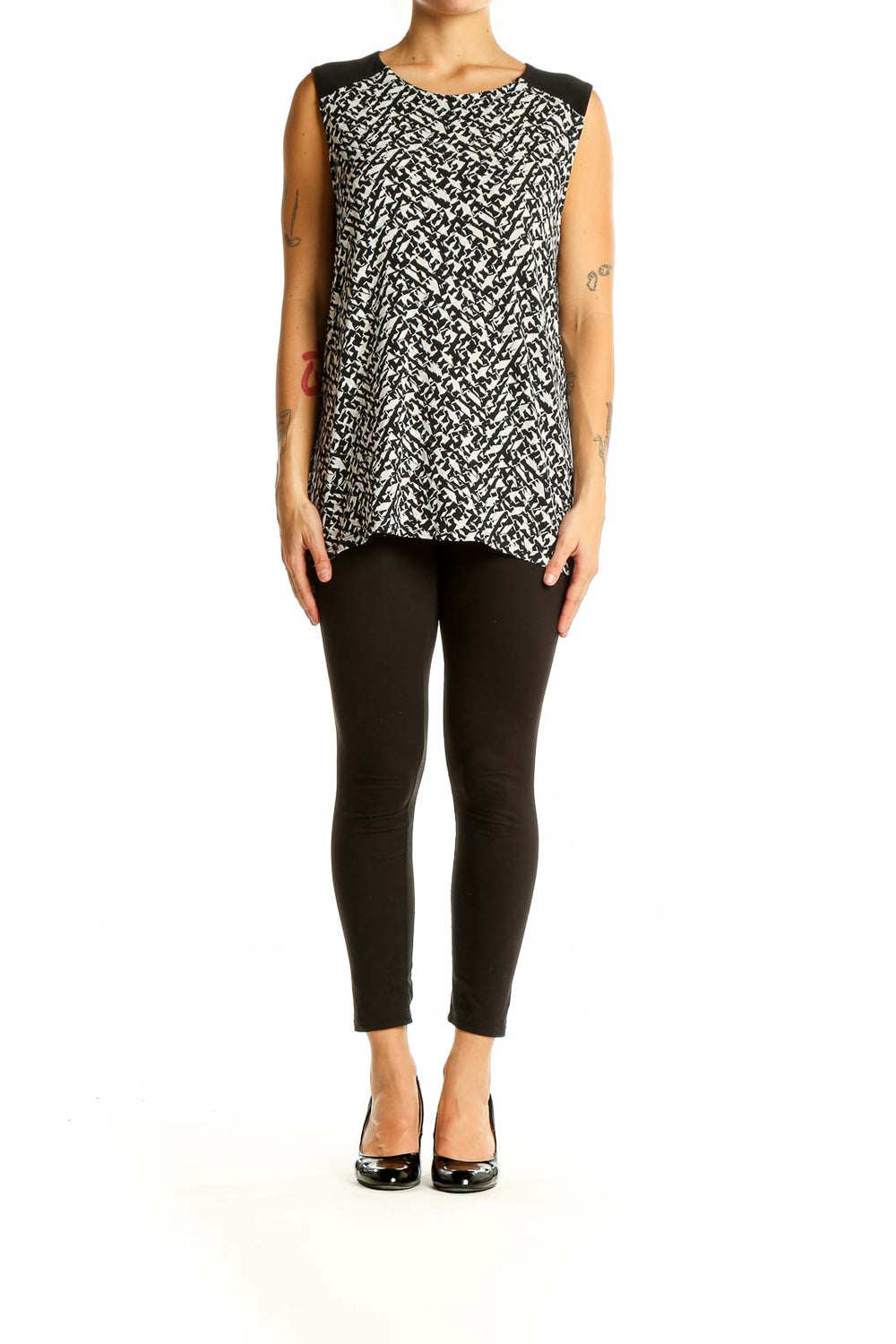 Front view of Vince Camuto black and white abstract print sleeveless top