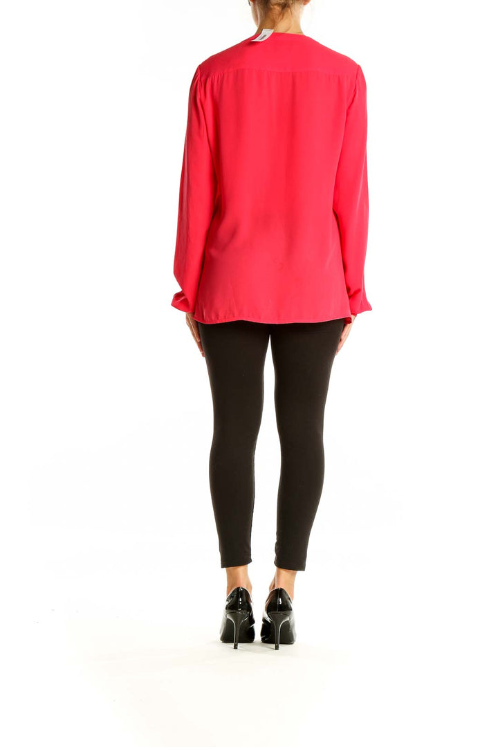 Back view of red Banana Republic blouse showing relaxed fit