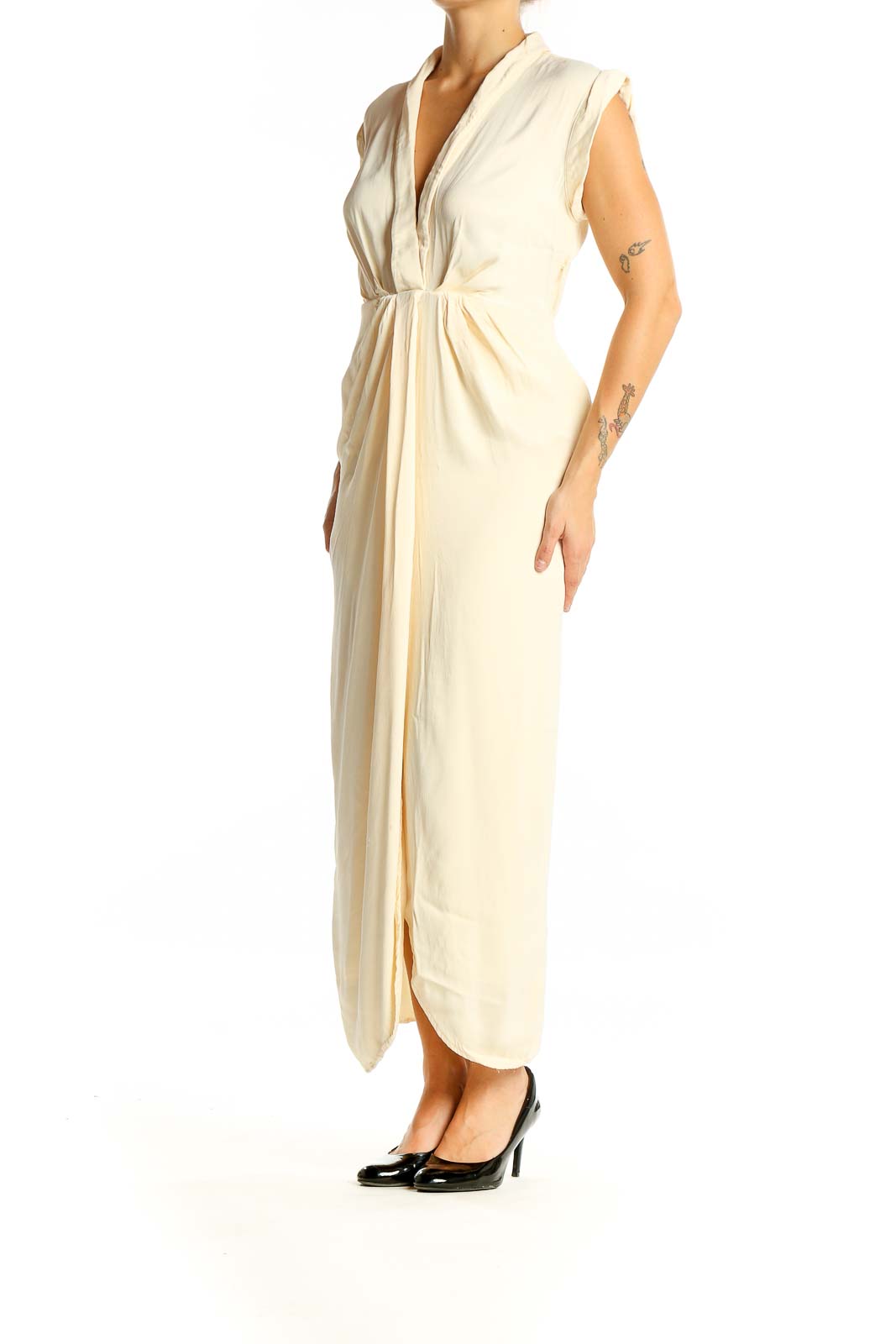 Front view of cream Anthropologie maxi dress with V-neck and gathered waist