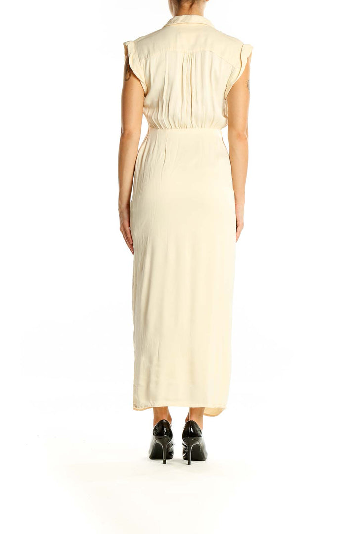 Back view of cream Anthropologie floor-length maxi dress