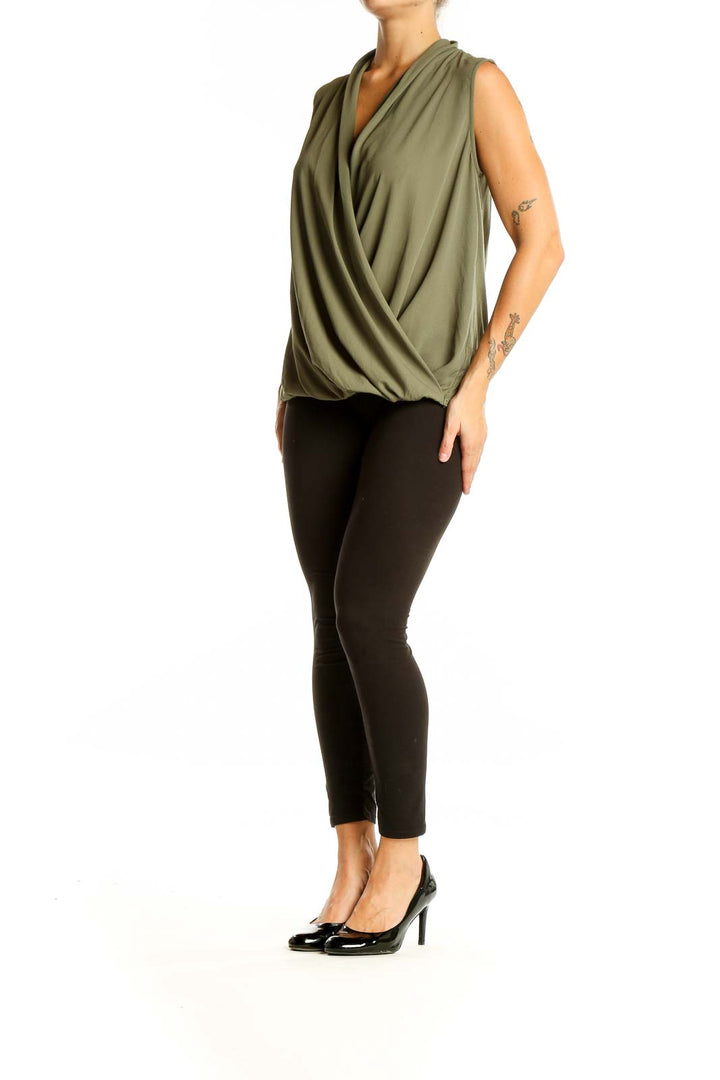 Front view of olive sleeveless wrap blouse from LOFT Outlet