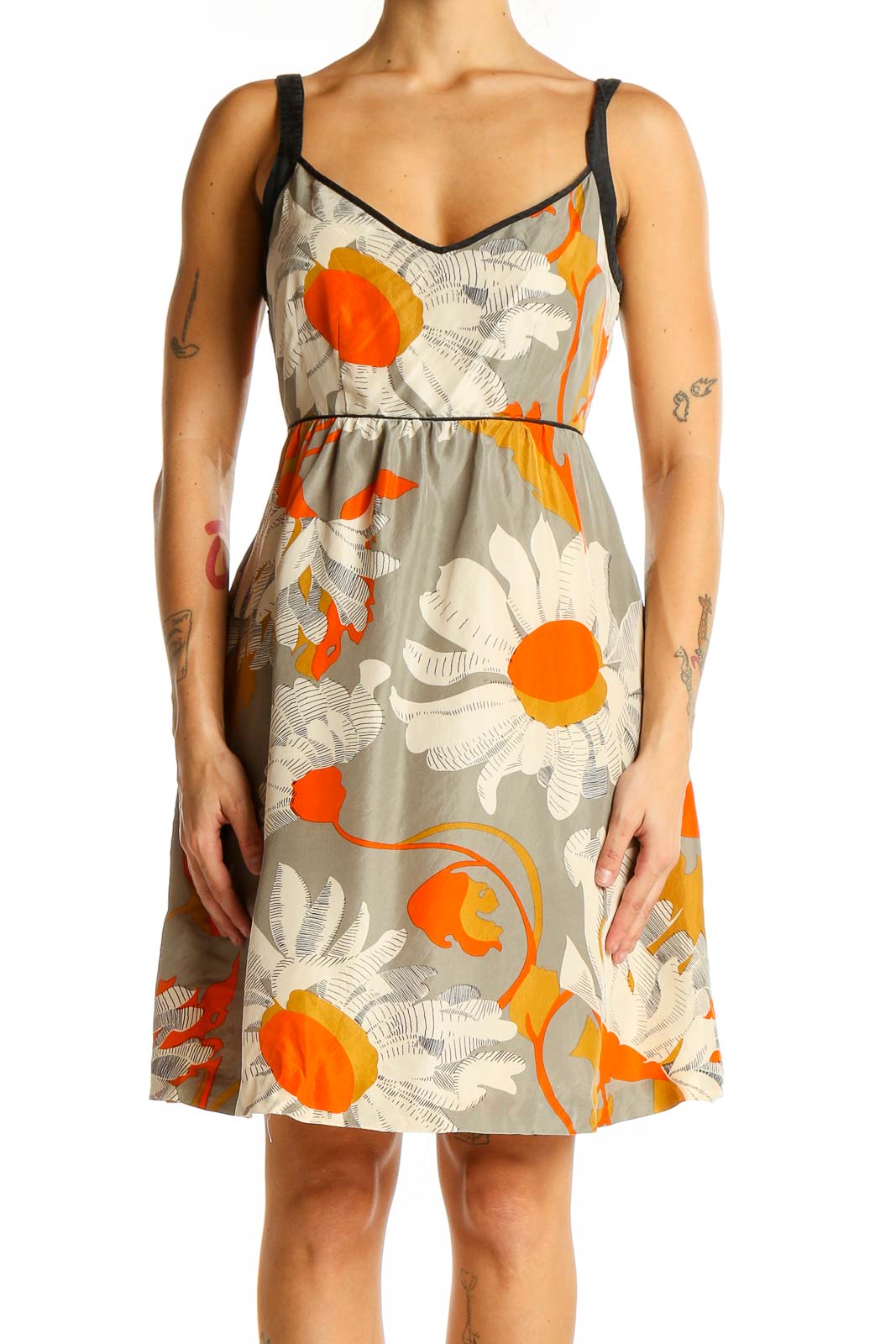 Front view of Moulinette Soeurs gray floral print sleeveless sundress with orange accents