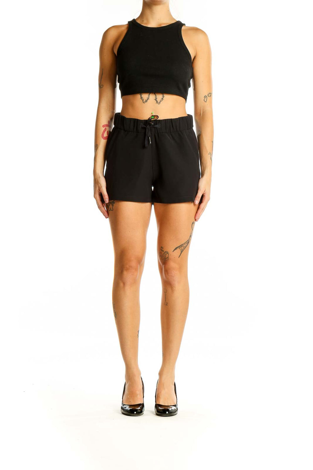 Front view of black Lululemon athletic shorts with drawstring waist