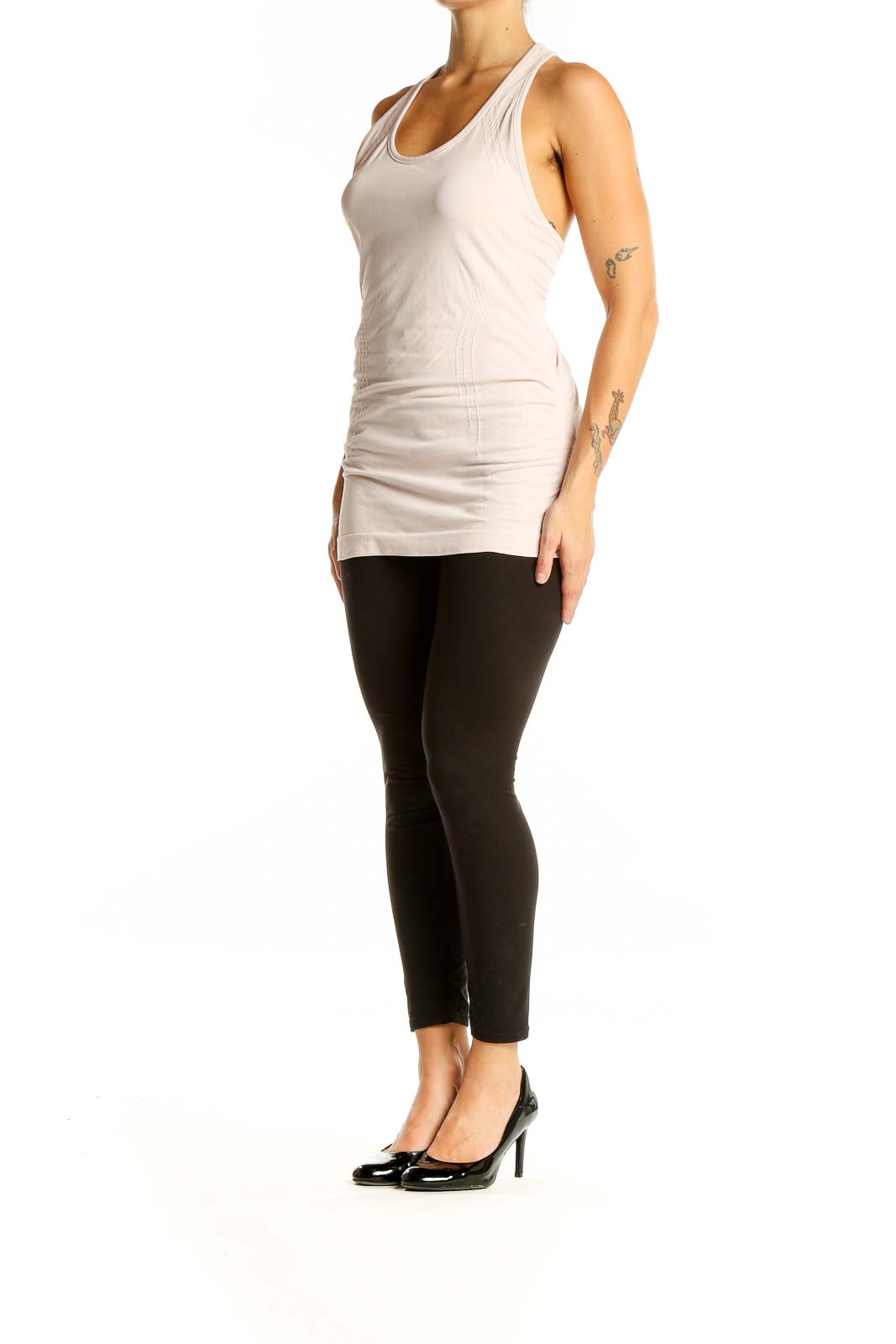 Front view of Athleta pale pink racerback athletic tank top