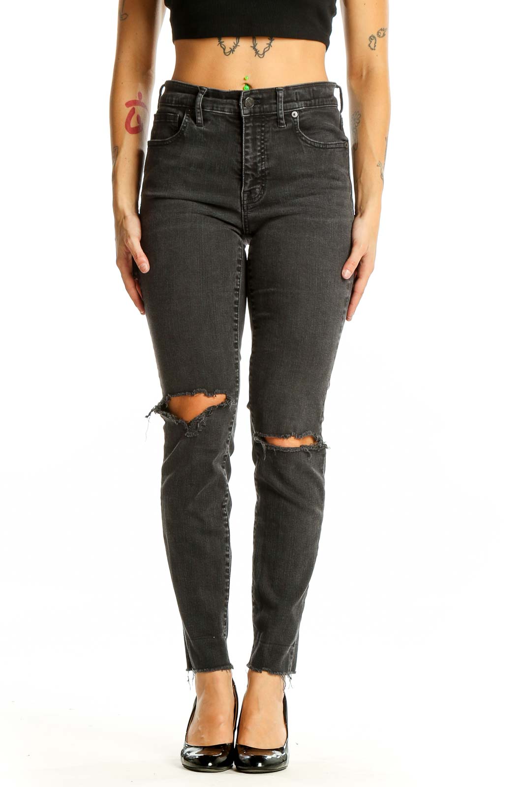 Front view of Madewell charcoal high-waisted skinny jeans with distressed knees