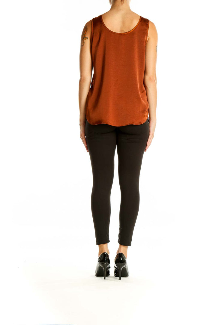 Back view of rust-colored Banana Republic sleeveless tank top on model