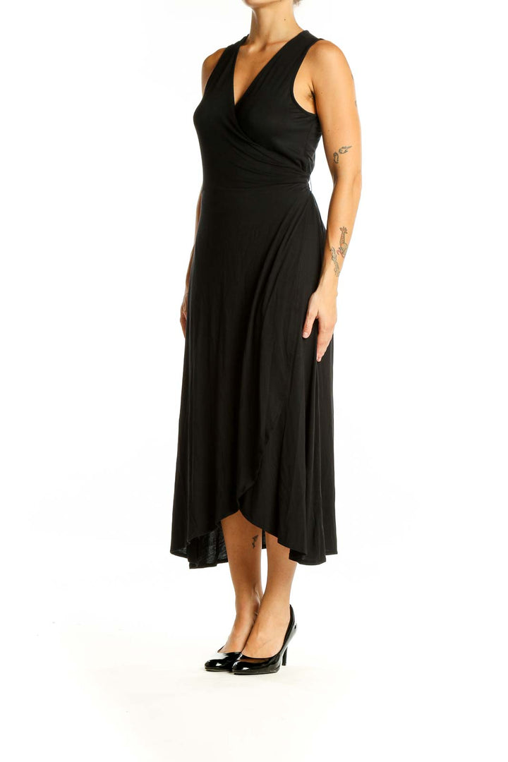 Front view of black Gap midi wrap dress with V-neckline