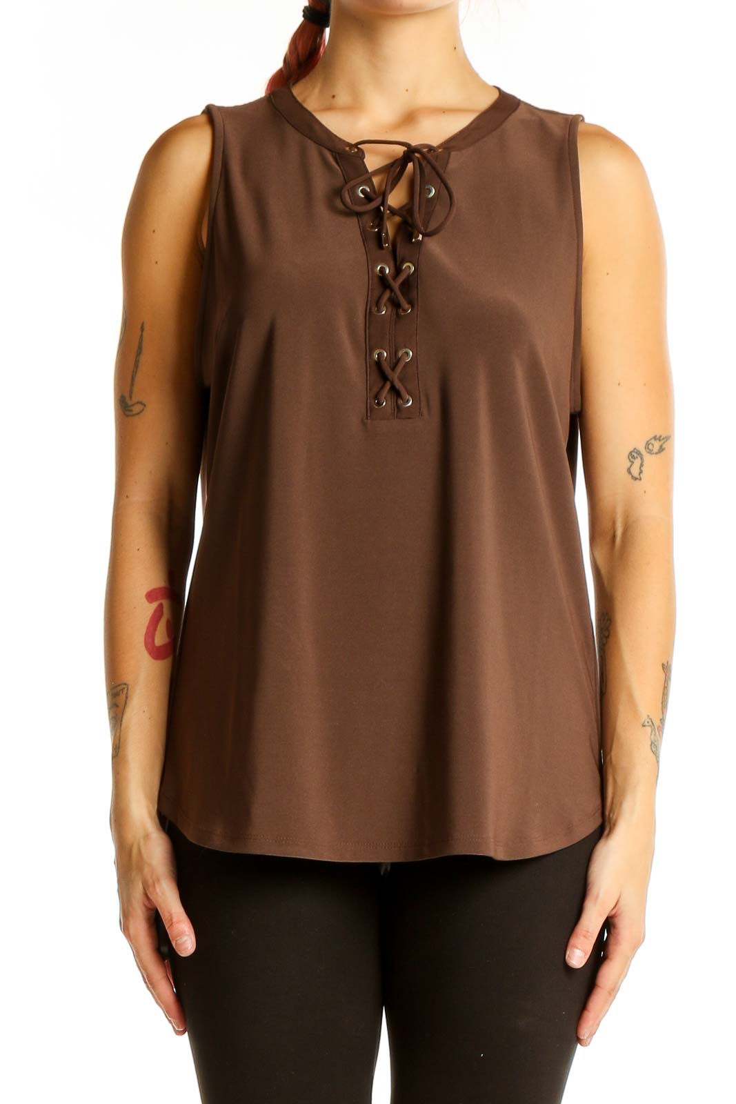 Front view of brown sleeveless blouse with lace-up neckline