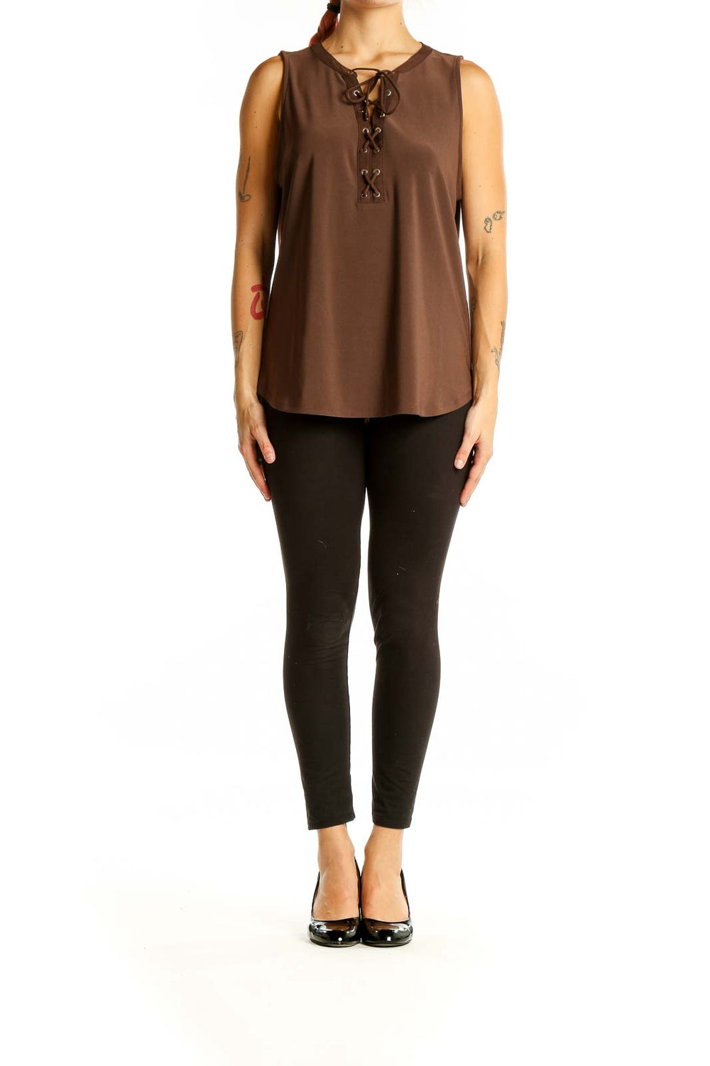 Front view of brown sleeveless blouse with lace-up neckline