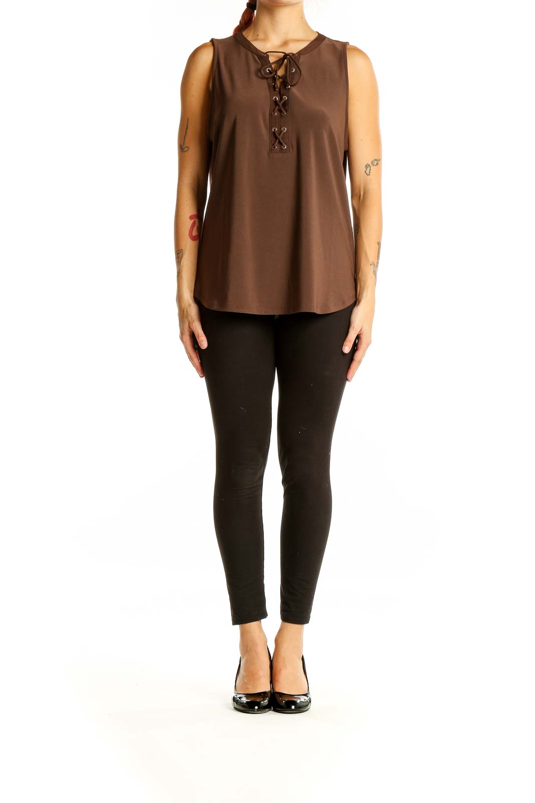 Front view of brown sleeveless blouse with lace-up neckline