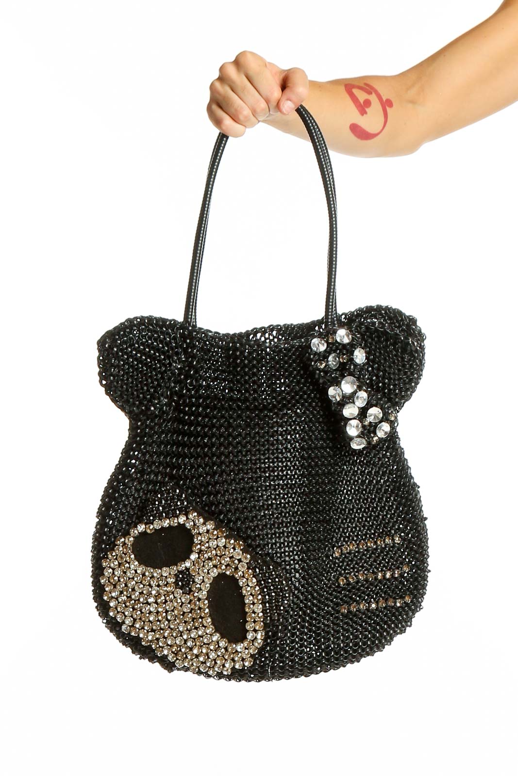 Front view of black beaded cat-shaped shoulder bag with crystal-embellished eyes