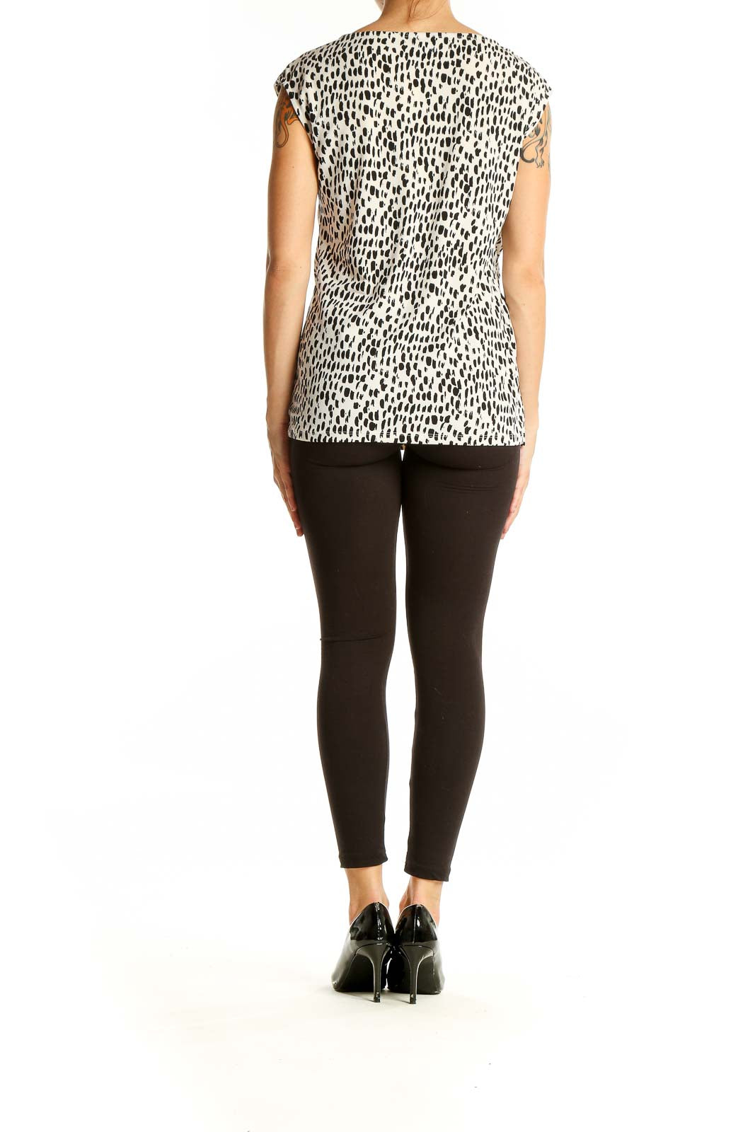 Back view of Ann Taylor black and white spotted cap sleeve top