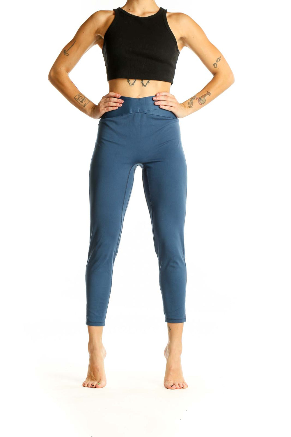 Front view of blue high-waisted cropped activewear leggings