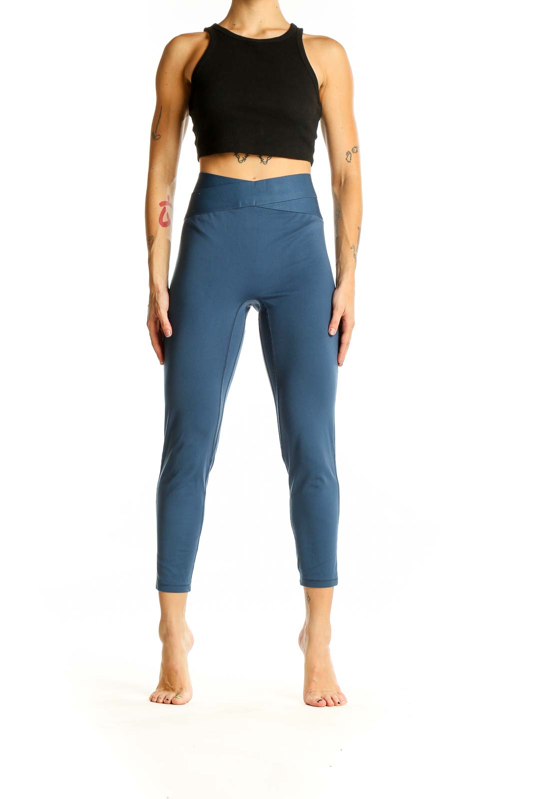 Front view of blue high-waisted cropped activewear leggings