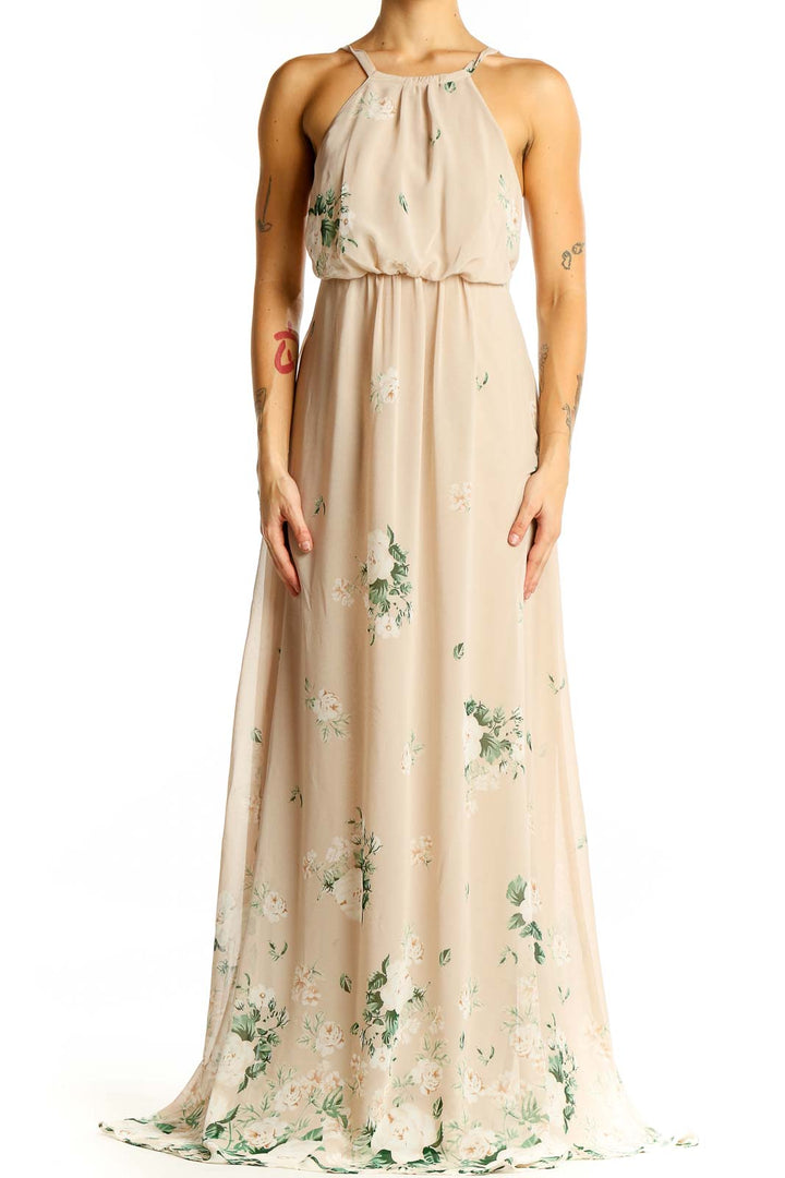 Front view of Mumu beige floral maxi dress with spaghetti straps