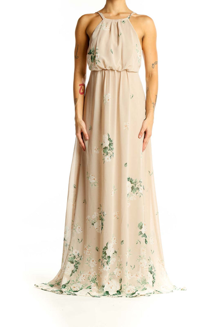 Front view of Mumu beige floral maxi dress with spaghetti straps