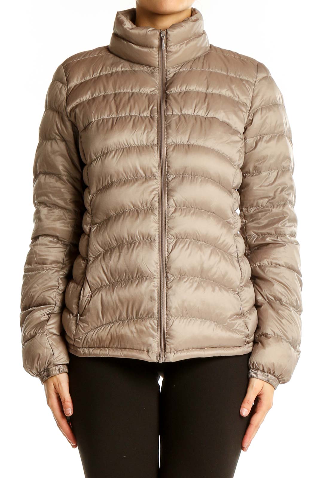 Front view of Uniqlo beige quilted puffer jacket