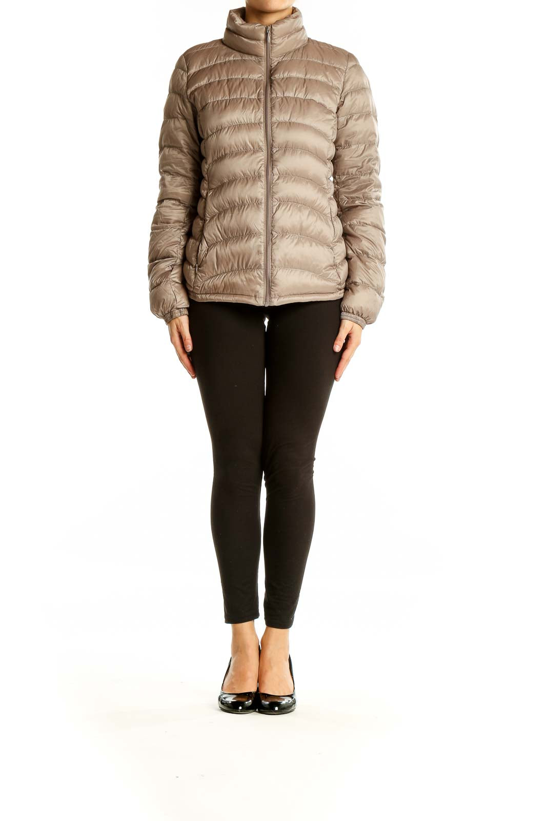 Front view of Uniqlo beige quilted puffer jacket