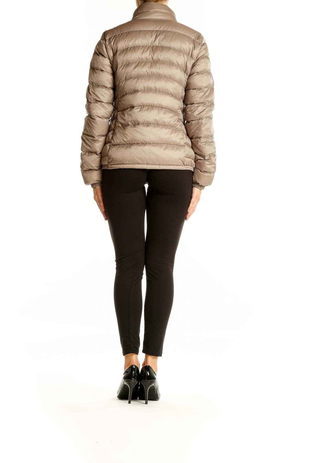 Back view of Uniqlo beige quilted puffer jacket