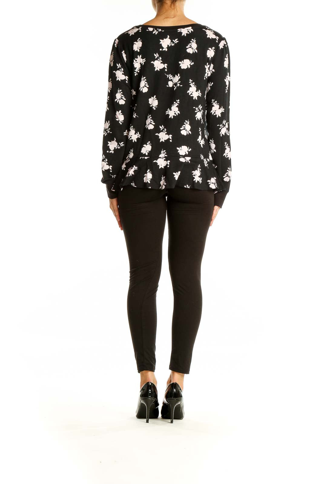 Back view of Kate Spade black floral print long sleeve top showing all-over pattern