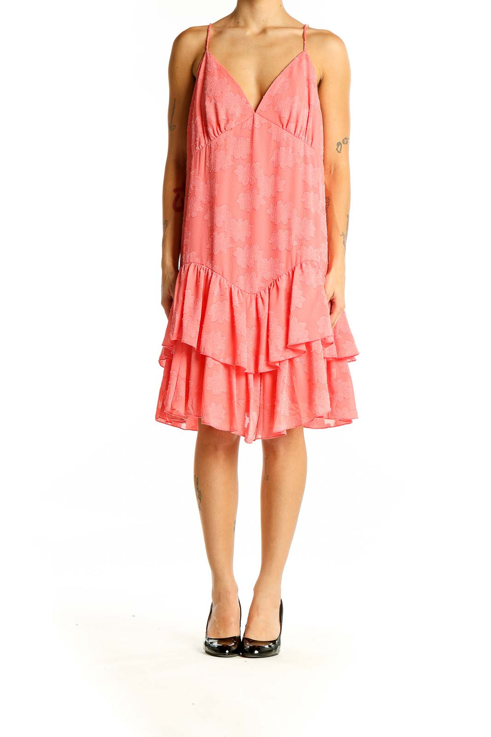 Front view of coral SilkRoll sundress with V-neck and tiered ruffle hem