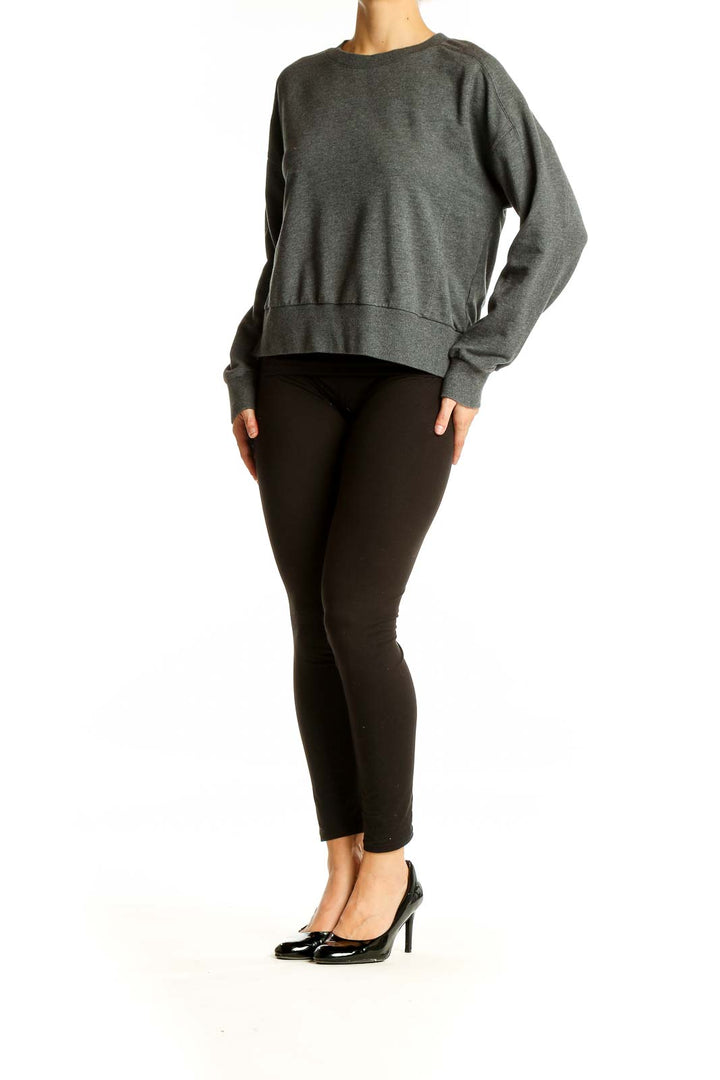 Front view of gray Banana Republic crewneck sweater on model