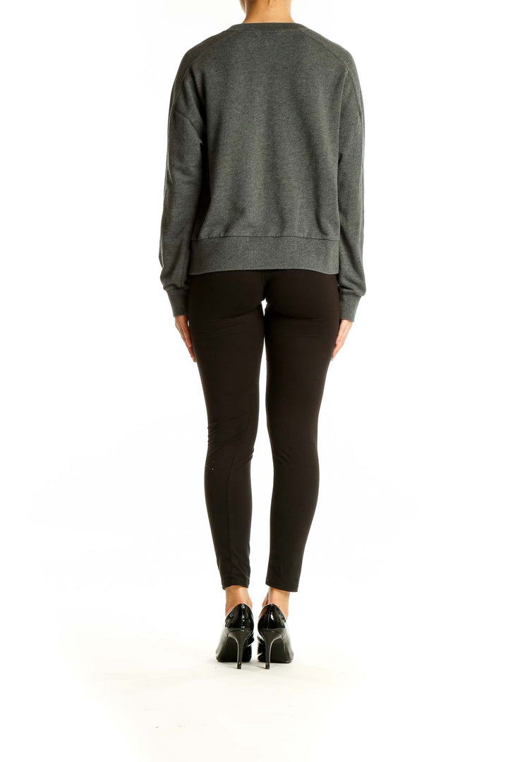 Back view of gray Banana Republic crewneck sweater on model