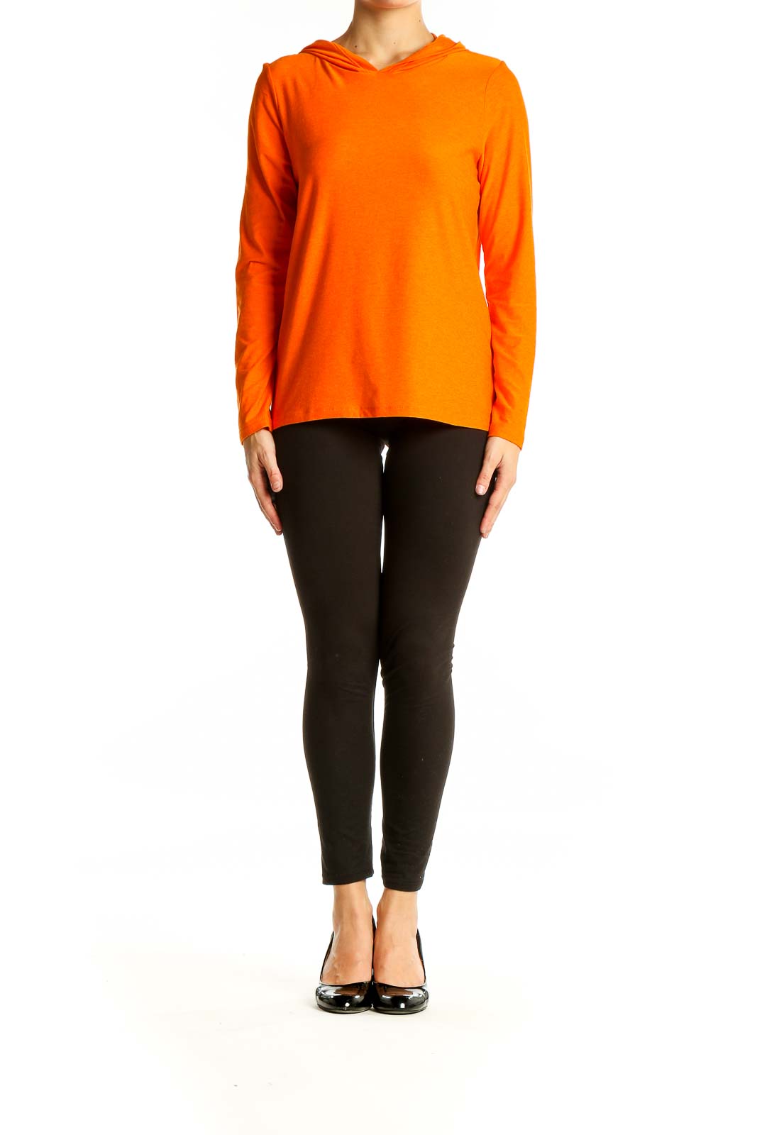 Front view of orange hooded long sleeve activewear top from Beyond Yoga