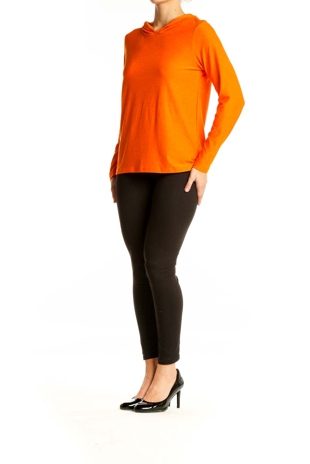 Front view of orange hooded long sleeve activewear top from Beyond Yoga