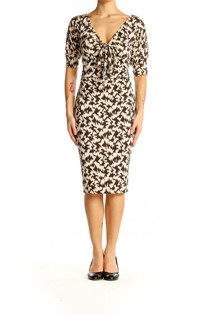 Front view of Diane von Furstenberg brown and cream abstract print silk dress with V-neckline