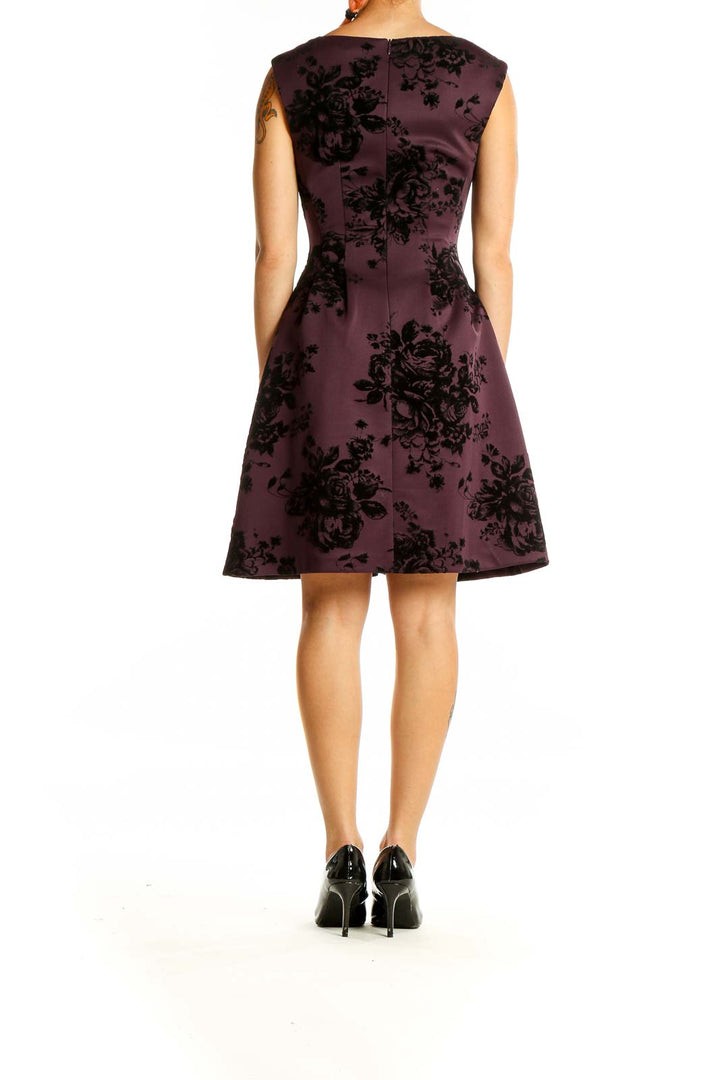 Back view of Vince Camuto plum fit-and-flare dress showing floral pattern and zipper closure