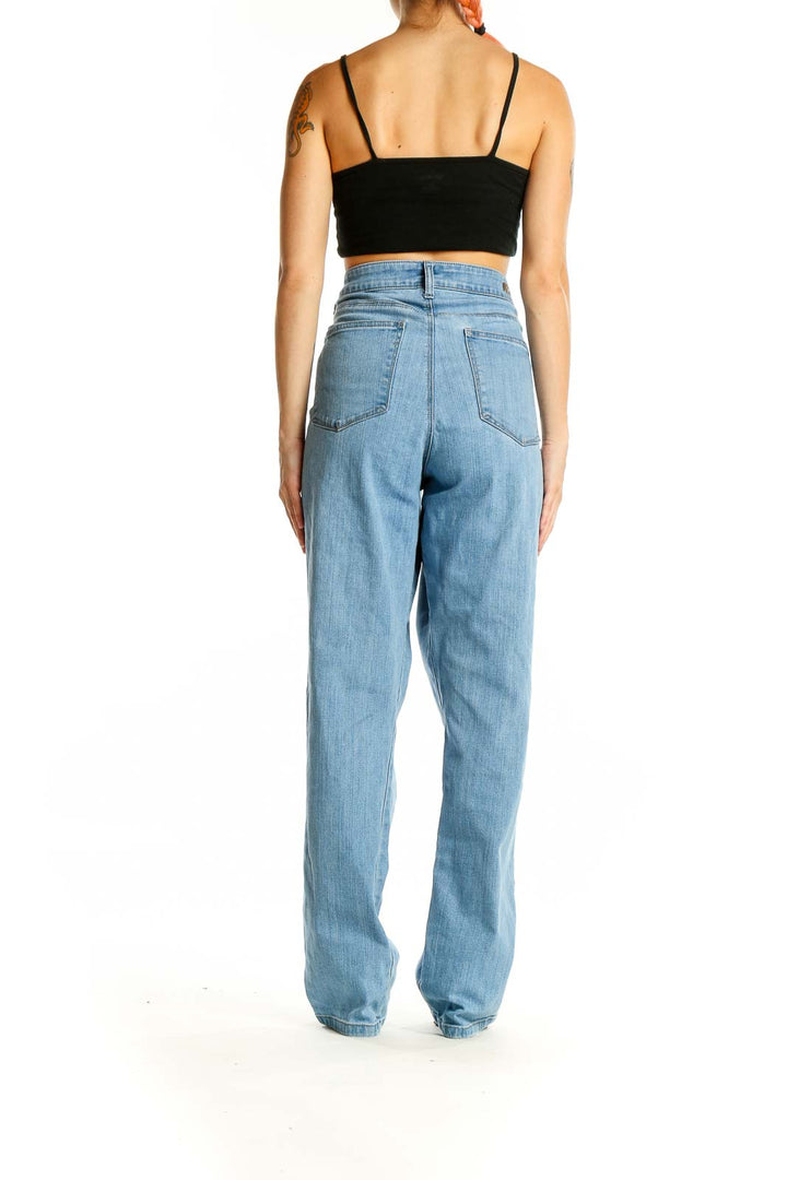 Back view of Lee light blue high-waisted wide-leg jeans on model